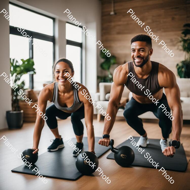 A Young Couple Working Out at Home stock photo with image ID: 1250c65c-a853-44df-b7e3-d0715907fc84