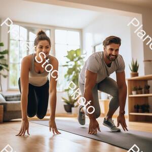 A Young Couple Working Out at Home stock photo with image ID: 03c5acf9-0055-4484-bb78-d6ecc0392fc8