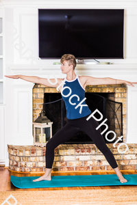 A young lady working out at home stock photo with image ID: 07ccdb0d-5ffd-4743-92b3-2d3030d2e85d