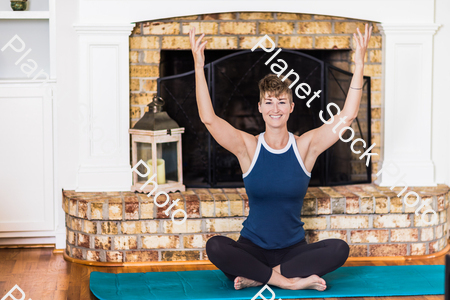 A young lady working out at home stock photo with image ID: 0c5fcd61-9938-4543-b2ad-3491d9de2132