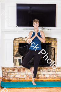 A young lady working out at home stock photo with image ID: 0e4fc3e0-6735-4898-b03e-dab19f756703