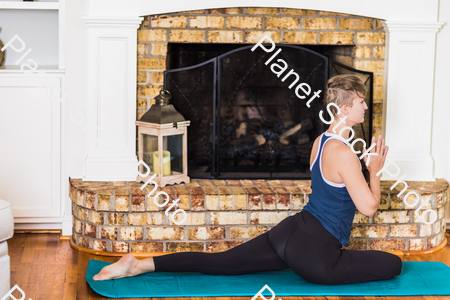 A young lady working out at home stock photo with image ID: 0ebf53e8-c2f4-4f4a-a962-5d0129248149