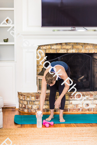 A young lady working out at home stock photo with image ID: 104d8033-3327-4e60-98a5-5460eb4184b8