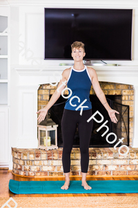 A young lady working out at home stock photo with image ID: 17702dee-6239-461a-879a-ac9ecf07ed73