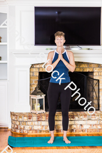 A young lady working out at home stock photo with image ID: 192fafeb-db57-4213-a35d-674d33cc9f90