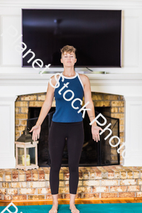 A young lady working out at home stock photo with image ID: 205d1647-faeb-4195-834d-7a6b82a8b72b