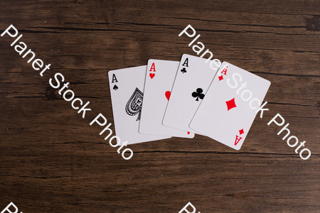 Four aces playing cards. Four playing cards of the same rank stock photo with image ID: 262d5780-f041-4c2a-a3f3-2e208be321dc