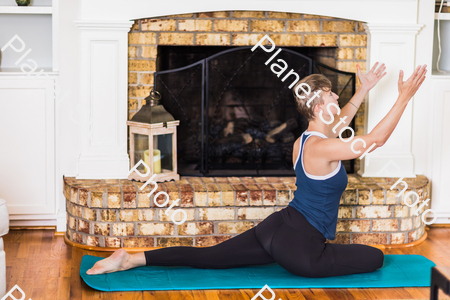 A young lady working out at home stock photo with image ID: 2fca3d2d-deb2-4e06-974f-794f56293e76