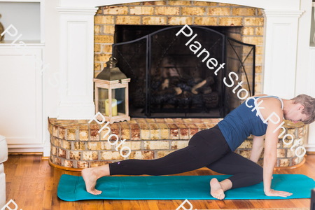 A young lady working out at home stock photo with image ID: 31716e0a-7c12-403c-877a-c4ce16009cf2