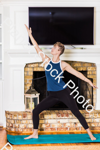 A young lady working out at home stock photo with image ID: 32d24c25-2acc-4f39-b2e1-364ea2b52f5f