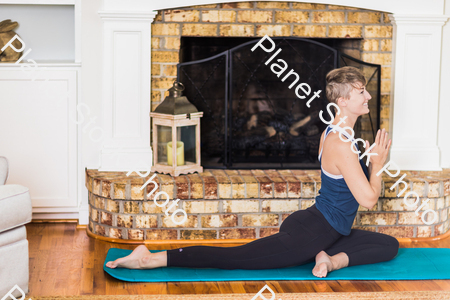 A young lady working out at home stock photo with image ID: 367f6937-7c52-4aab-a38a-859bf071ed70