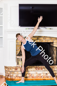 A young lady working out at home stock photo with image ID: 4260a756-3610-49c0-8a3e-2a4000a2922b