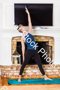 A young lady working out at home stock photo with image ID: 43f6e746-772f-40a3-ae7a-d01b1f336fc9