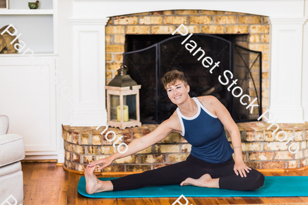 A young lady working out at home stock photo with image ID: 4ca0fa97-acf3-43c5-ae09-15ab640e9960