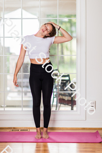 A young lady working out at home stock photo with image ID: 5563a87c-48b0-4ba4-98e0-9ed91b595f84