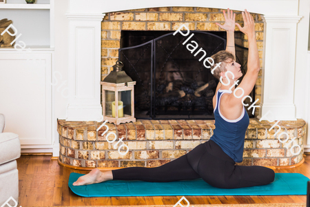 A young lady working out at home stock photo with image ID: 5ee64891-ccff-42cb-9001-69141c2c13dc