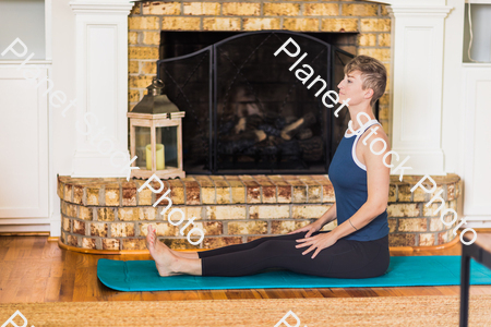 A young lady working out at home stock photo with image ID: 6ddef354-0a09-4315-a798-d8ac37e8e309