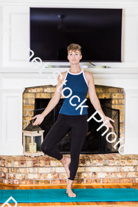 A young lady working out at home stock photo with image ID: 71470526-c381-4622-a4df-f4c269de80f1