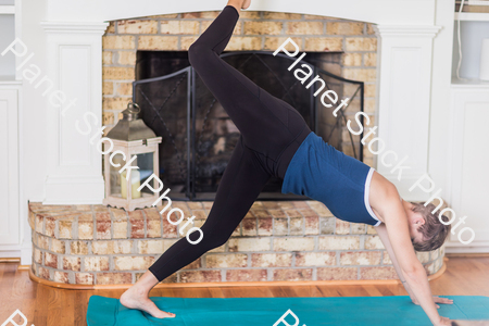 A young lady working out at home stock photo with image ID: 804563d5-f284-4b02-bdc9-75c80bdf1fc9