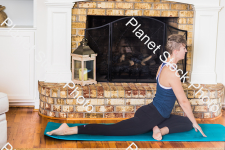 A young lady working out at home stock photo with image ID: 8663a4ef-5fbe-4a0c-922e-6fe57193493e