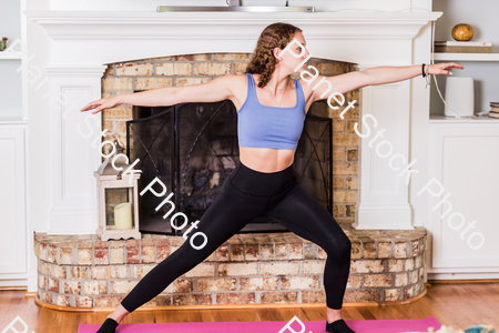 A young lady working out at home stock photo with image ID: 87336569-9adc-4f60-aad2-d47976d92095