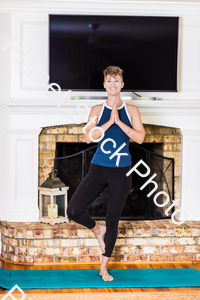 A young lady working out at home stock photo with image ID: a85fbf5b-36b0-45a2-b51f-268afdb91fd0