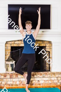 A young lady working out at home stock photo with image ID: b8f785a5-c969-4dff-9926-7d3e05d1144e