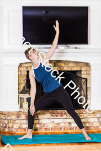 A young lady working out at home stock photo with image ID: bf5c072b-d192-4c8a-8366-07f84d143a72