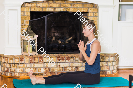 A young lady working out at home stock photo with image ID: d7acbe52-9cd3-4164-84fb-523bd35e9dbc