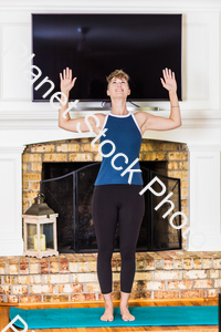 A young lady working out at home stock photo with image ID: dae334c4-10c1-4b0c-92e0-a8cc7d09bc7a