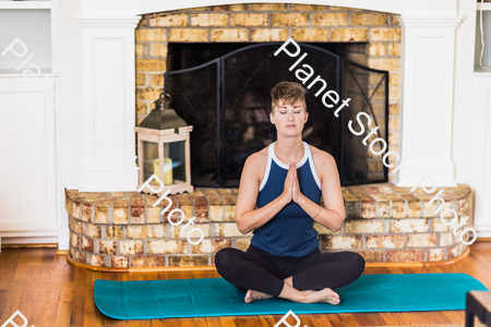 A young lady working out at home stock photo with image ID: dbcf9ccb-0a4b-4b42-8924-c12cd5dccca5